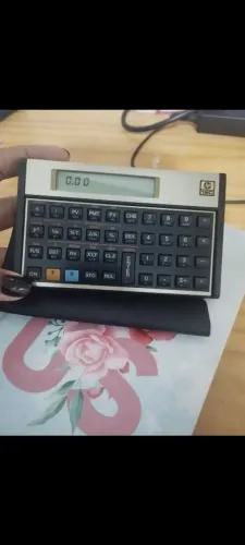 Calculadora HP12C + Calculadora Comum