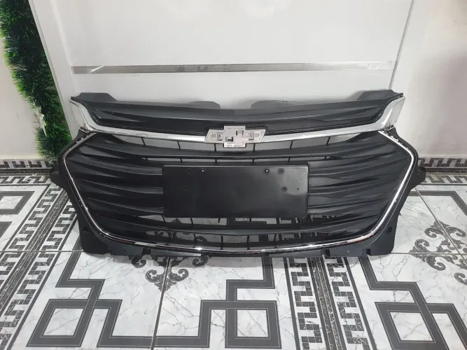 Grade Onix Hatch 2024 com todos frisos