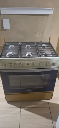 Doação de fogão e armário de de cozinha.