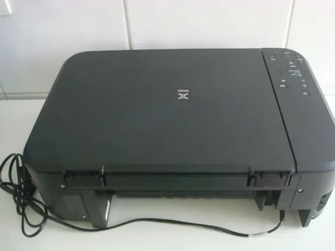Vendo impressora cannon  funcionado usada 