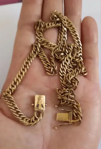 Corrente de moedas antigas com fecho com imagem da Santa Nossa Senhora Aparecida