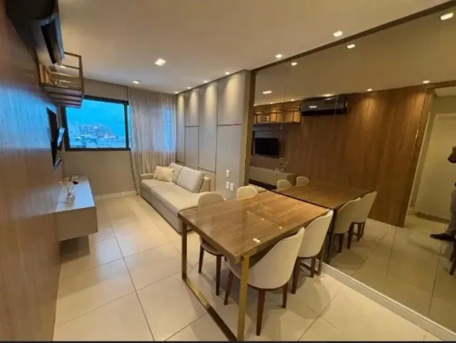 Quarto e sala no edifício Le Grand
