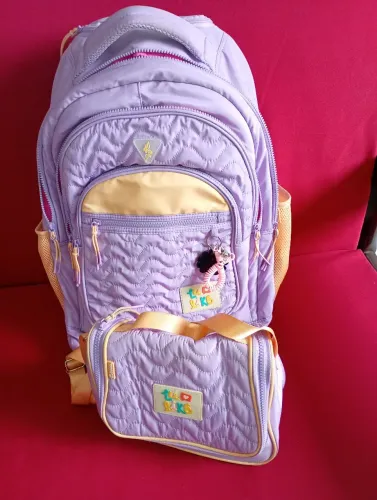 Mochila Luluca rodinhas