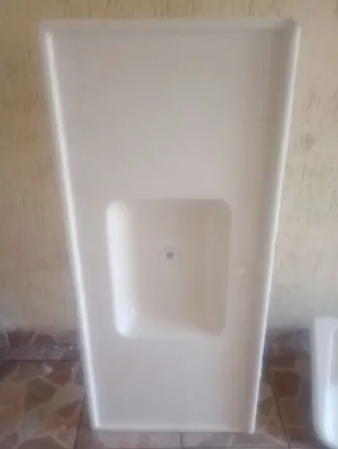 Vende uma pia de mármore sintético e um tanquinho