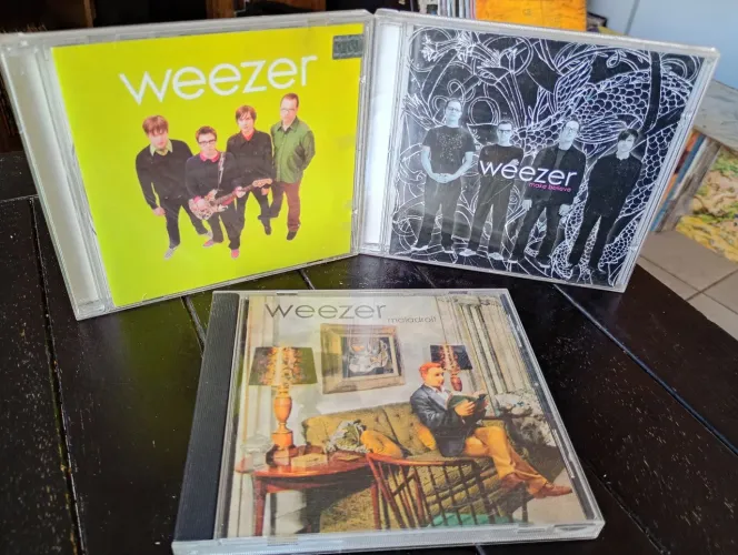3 CDs WEEZER Leia A Descrição