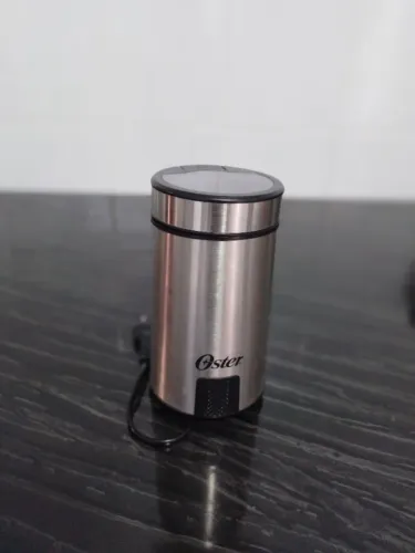  Moedor de Café Oster Inox Preto e Prata - 110v