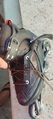 Vendo patins número 35 axelo preto semi novo