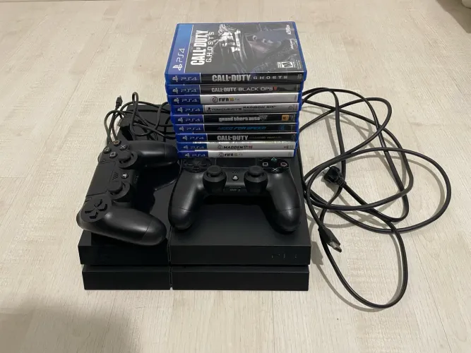 PS4 + 2 Controles + 9 Jogos + Headphone Stereo