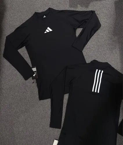 Camisa de compressão UV50 premium