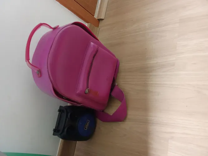 Bolsa petit Jolie e caixinha de som