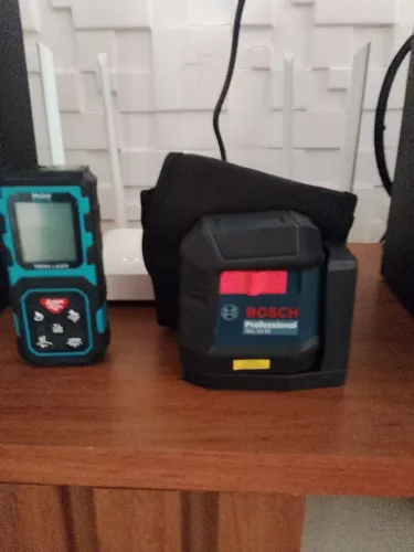 Trena e nível laser