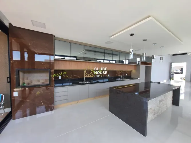 Casa com 4 suítes e móveis planejados à venda por R$ 2.390.000 - Condomínio Resi