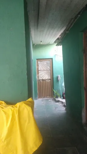 Casa com 3 Quartos, 1 Banheiro.