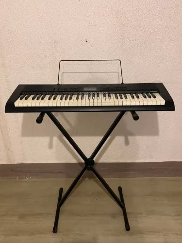 Teclado Casio CTK-1200 com suporte, bolsa almofadada e suporte para partitura/pasta