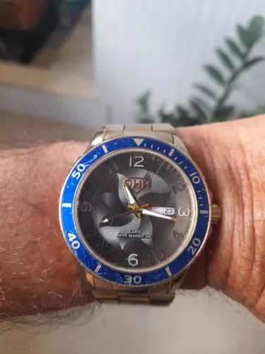 Vendo um relógio orient funcionando perfeitamente 
