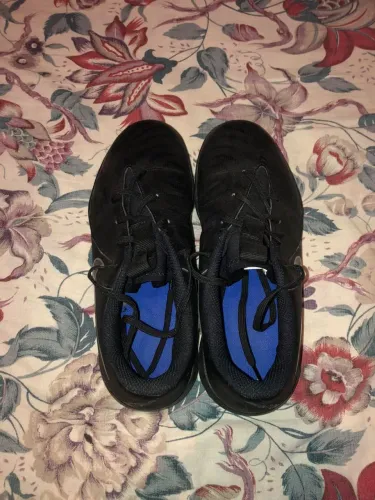 Chuteira Nike Phantom gx preta e azul