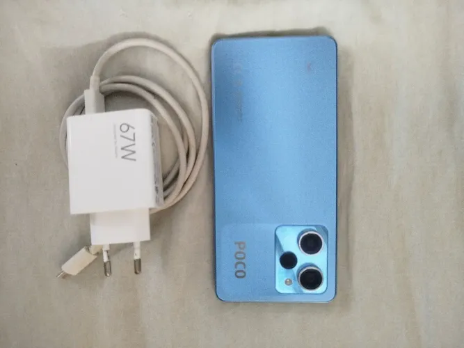 Celular poço x5 pro 5G 128Giga de memória, único dono, sem marcas de uso, carregador origi