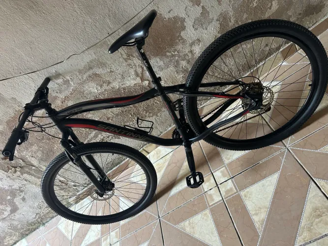 Bicicleta barato nota revisada freios a óleo tudo bacana pra ir rápido ! 