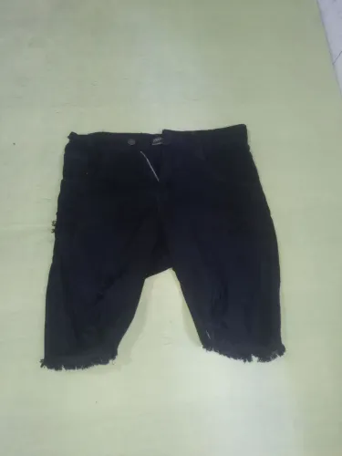 Bermuda jeans rasgada