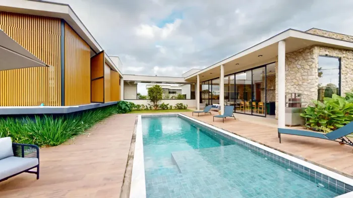 Casa térrea alto padrão para venda 4 suítes e piscina no Residencial Jequitibá.