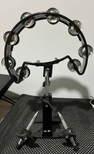 Suporte para pedal percussão e pandeirola. Leia