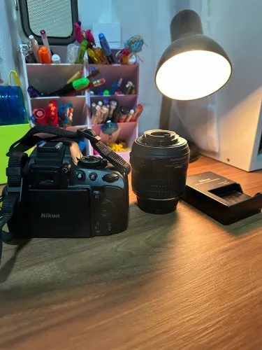 Nikon D5100 + lente 18-55mm (único dono)