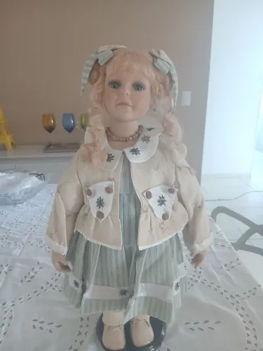 Bonecas em porcelana
