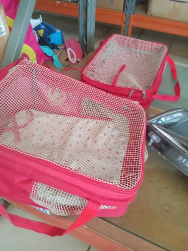 VENDO UMA BOLSA PET AERIAL PARA TRANSPORTE DE CÃES E GATOS EM AVIÃO 5X20CM/VERMELHO
