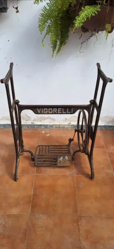 Pé de maquina de costura ferro