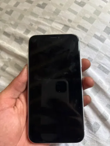 iPhone XR/. 72% de bateria