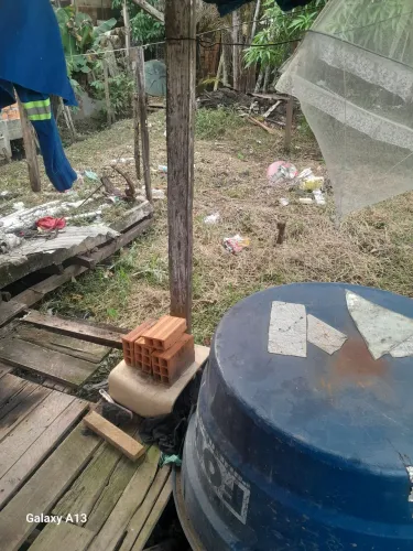  Vendo terreno com uma casa de madeira 