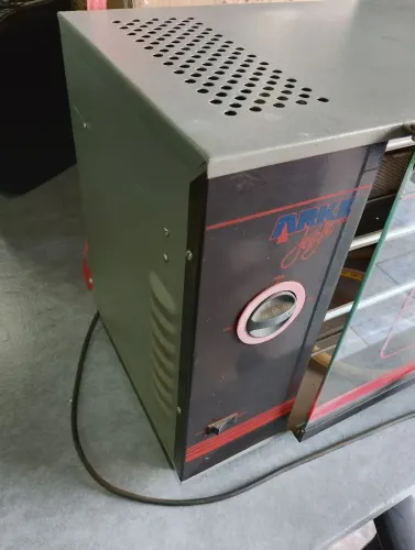 Máquina portátil de assar frango