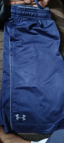 3 shorts running under Armour P M G ; 1 NiKE P