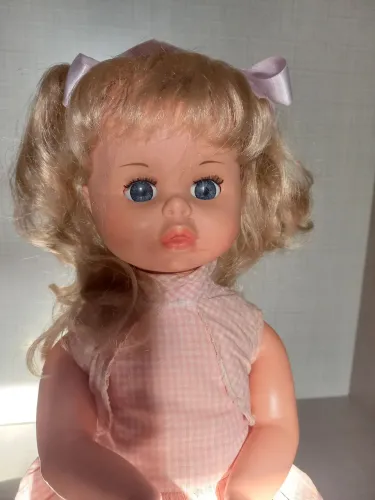 Boneca bate palminha