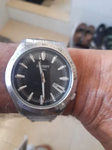 Vendo um relógio orient funcionando perfeitamente 