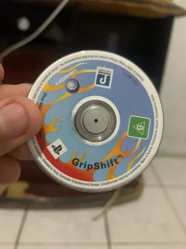 Jogo GripShift para PSP - UMD Original (Apenas o Disco)