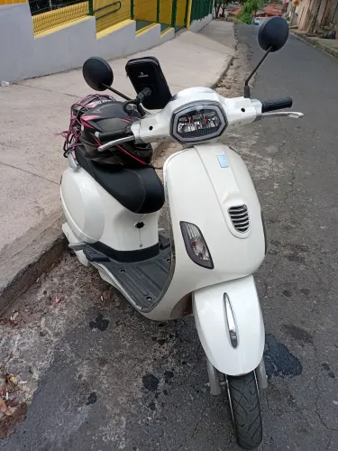 Scooter eletrica não precisa cnh sair rápido 
