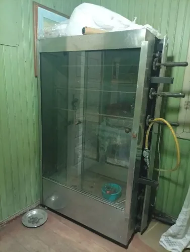 Máquina de frango assado