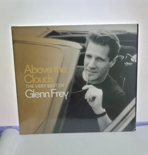 CD Above the Clouds the very best of Glenn Frey<br>Clouds<br>THE VERY BEST OF<br>GlennFrey