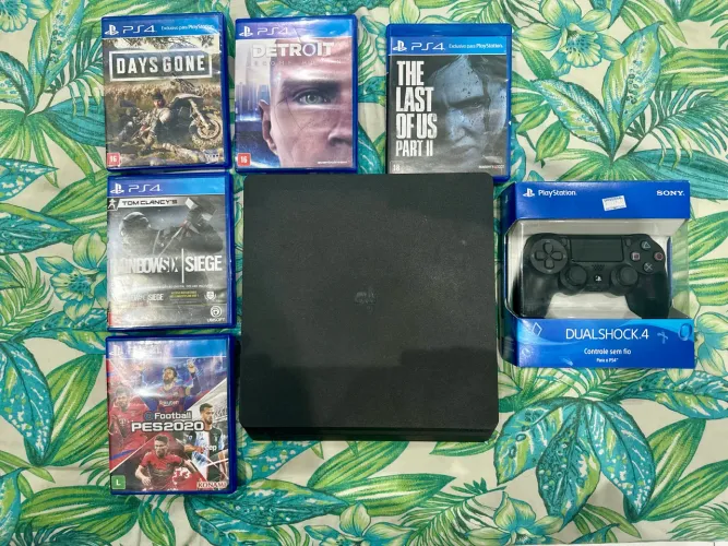 Vendo PS4 slim 1T memória com 5 jogos mídias físicas