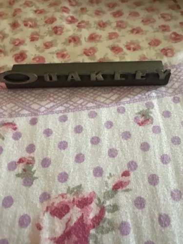 Placa de metal Oakley 