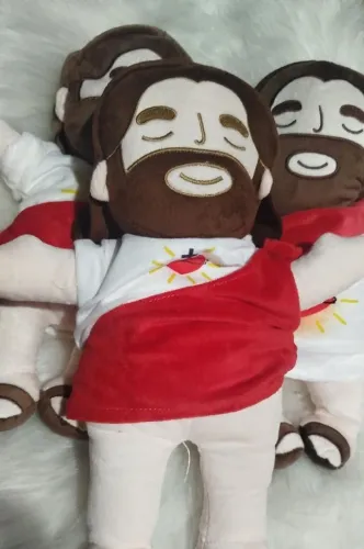 Brinquedo/boneco de jesus que respira, toca música e acende luz 