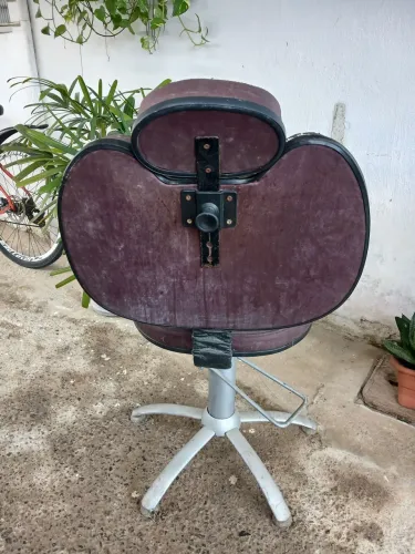 Cadeira de cabeleireiro(a)