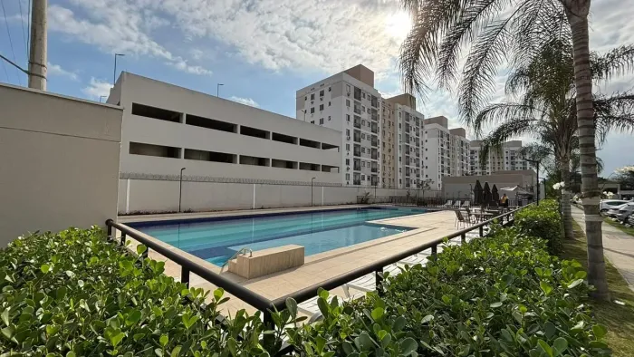 Merito Residencial ao lado do Park Jacarepagua Varanda cozinha planejada sala em porcelana