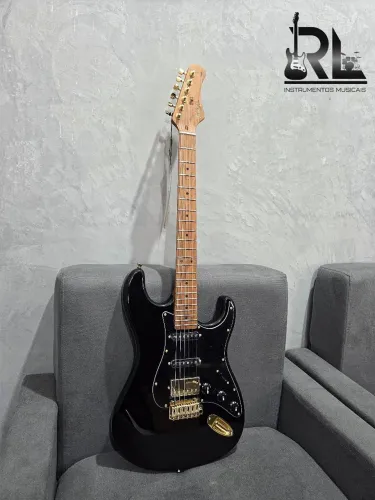Guitarra Tagim T640 preta e dourada 