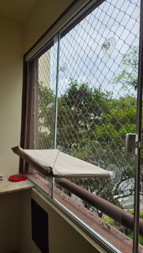 Cama suspensa de janela para gatos