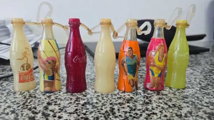 Lote Coleção Mini Garrafinhas Coca-Cola Olimpíadas Sydney 2000 (7 Unidades)