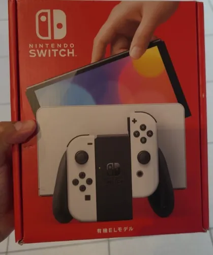 Nintendo Switch Oled 64gb Branco e Preto.