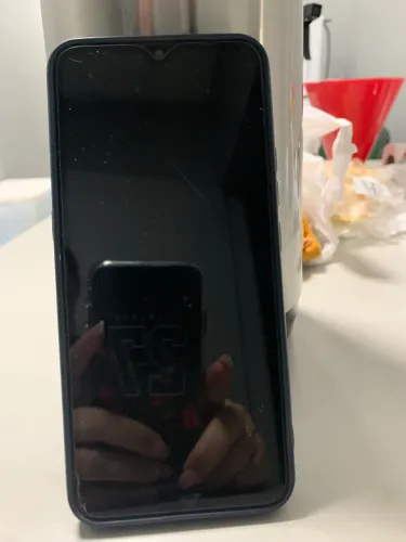 Vendo celular moto E 7 bem conservado acompanha carregador 