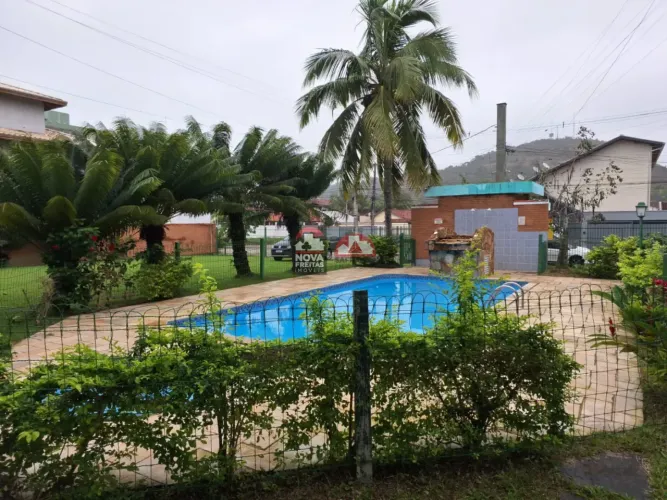 Venda de Casa - Sobrado Condomínio no bairro Martim de Sá em Caraguatatuba/SP